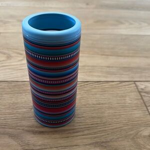 Koozie for seltzer and some beer cans.